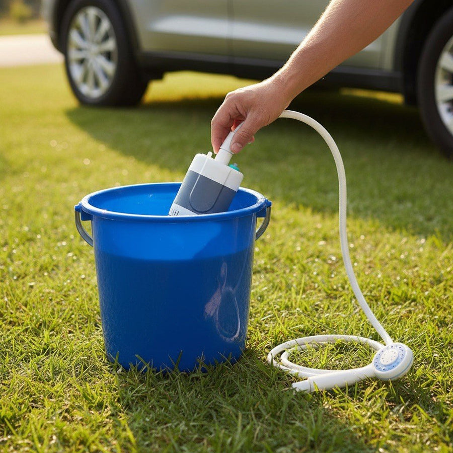 Lowering the pump into a bucket of water