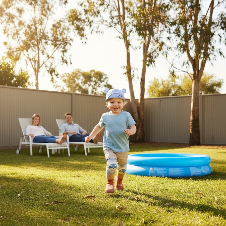 Toddler running to the paddle pool