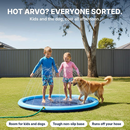 Two kids and a dog playing in the splash pad jets